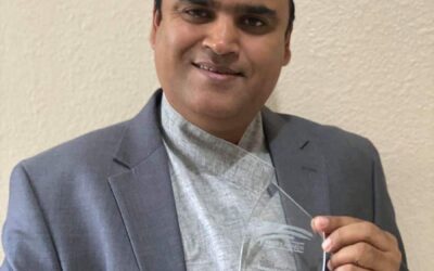 Adhikari receives Immigrant Journey Awards in Texas